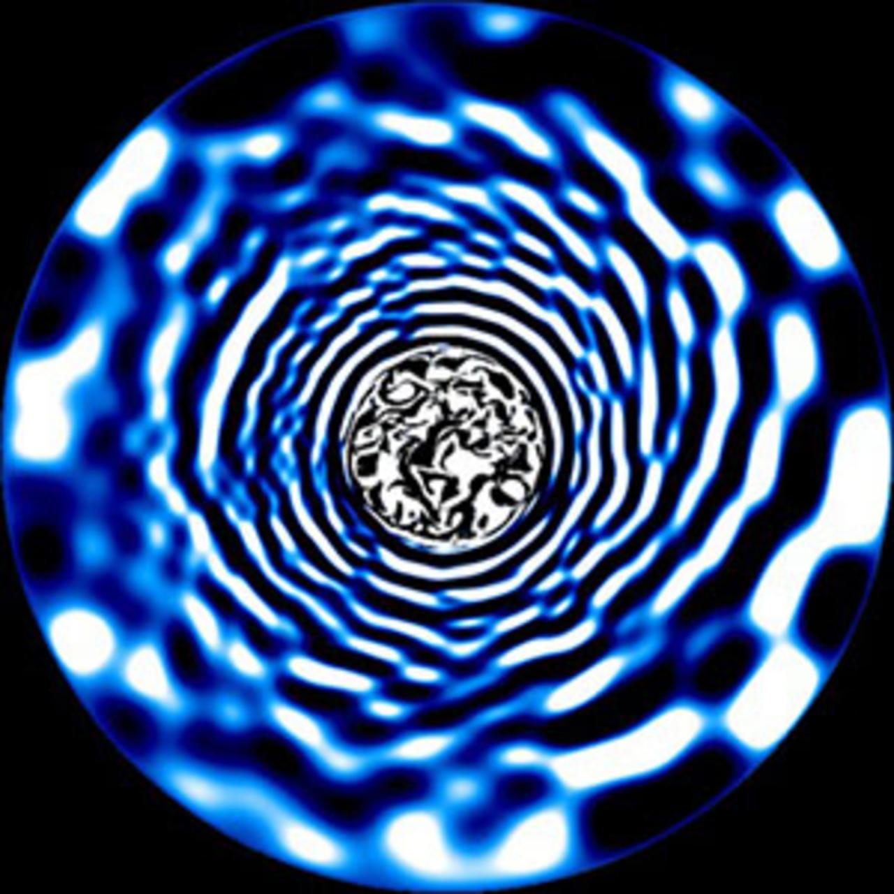A snapshot from a hydrodynamical simulation of the interior of a star three times as heavy as our Sun, which shows waves generated by turbulent core convection and propagating throughout the star's interior. Credit: Tamara Rogers.
